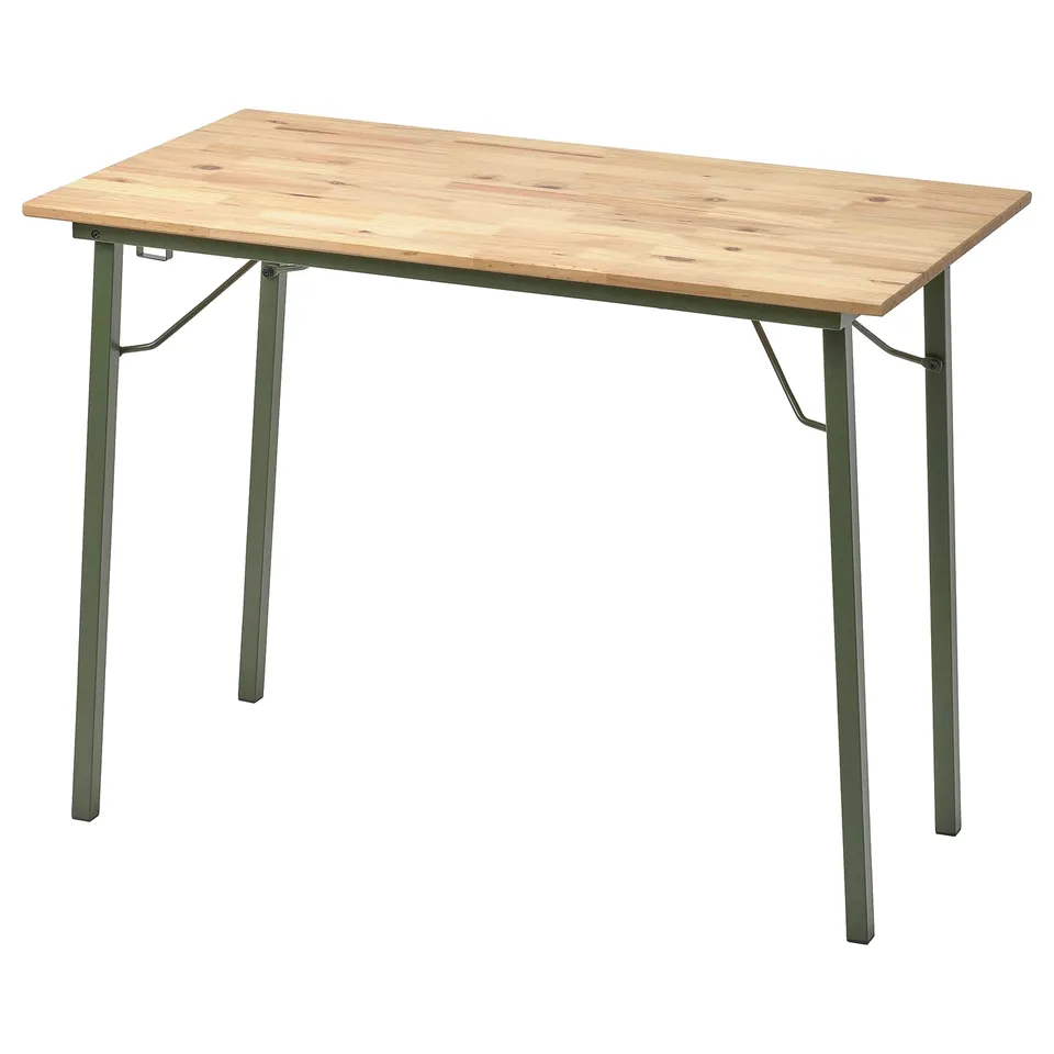 An IKEA KOMPISHÄNG table, light brown, with metal legs, rectangular shape, foldable design.