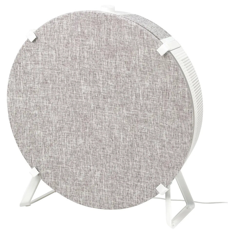 A grey IKEA STARKVIND air purifier with a round shape, supported by a white stand.