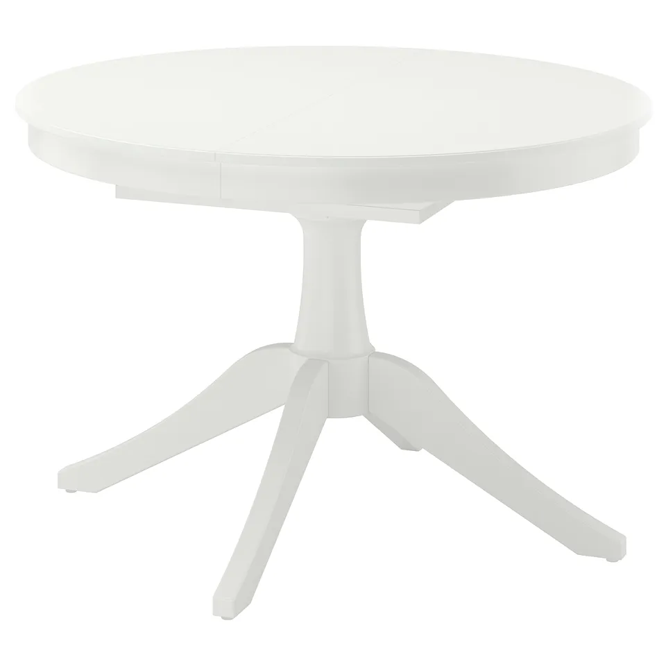 A white ROSENTORP extendable dining table with a round top, four angled legs, and a traditional design.