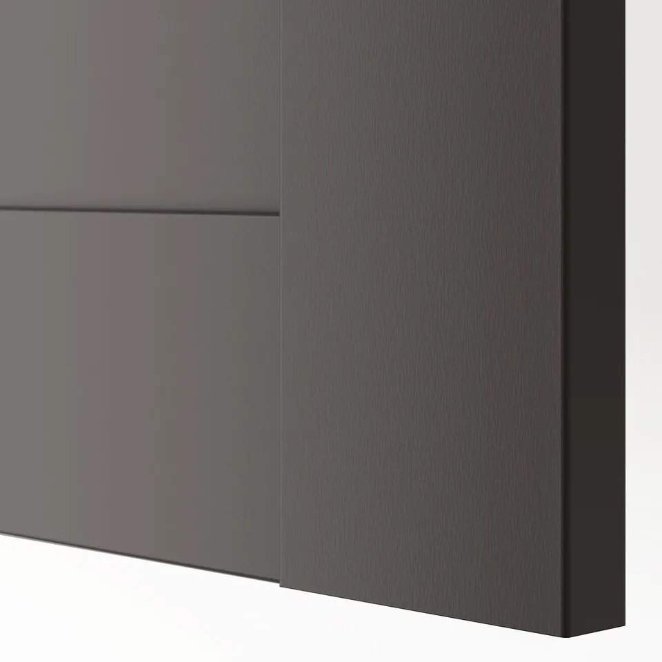 Close-up of modern, dark grey BERGSBO cabinet door with sleek, semi-matte finish.