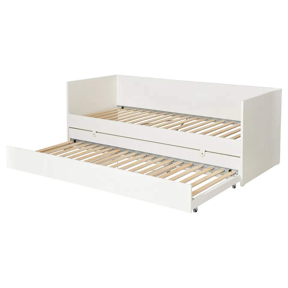 White trundle bed frame VIHALS with slats, minimalist design.