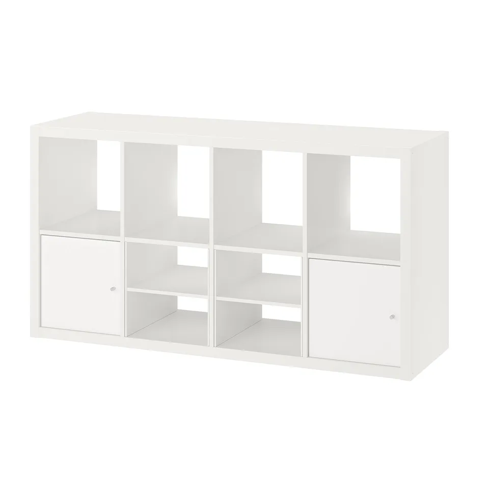 White KALLAX shelving unit with cubes and doors. Modern, rectangular, clean design for storage.