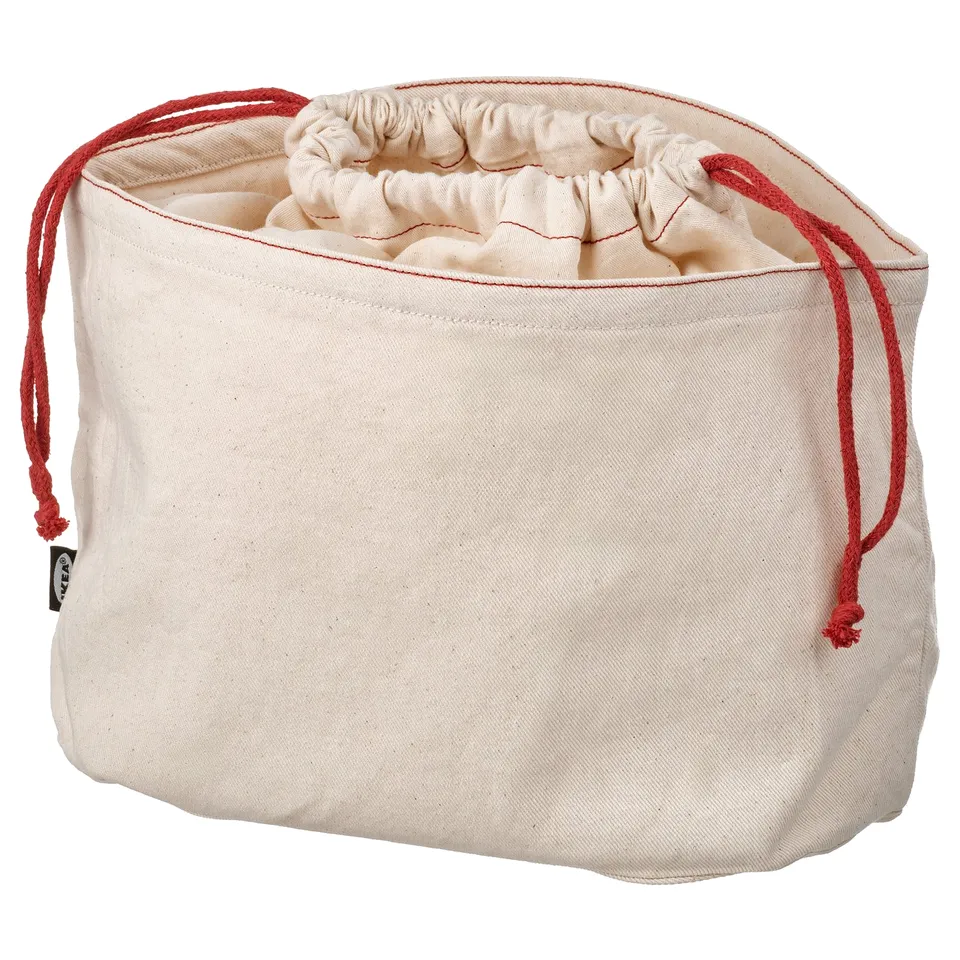 A white GULLRISMOTT cotton bread bag with red drawstrings, square shape, simple design.
