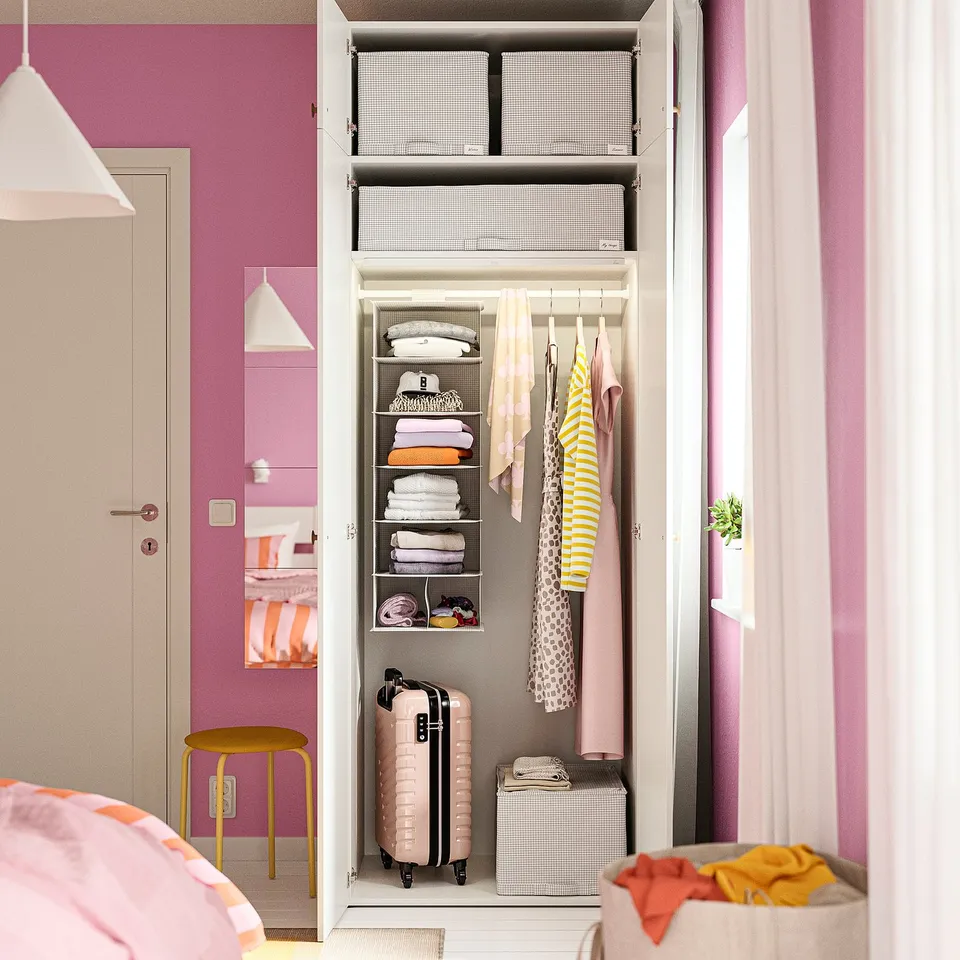 Wardrobe organises clothes, bags, and luggage efficiently, fits in small spaces, adjustable for uneven floors.