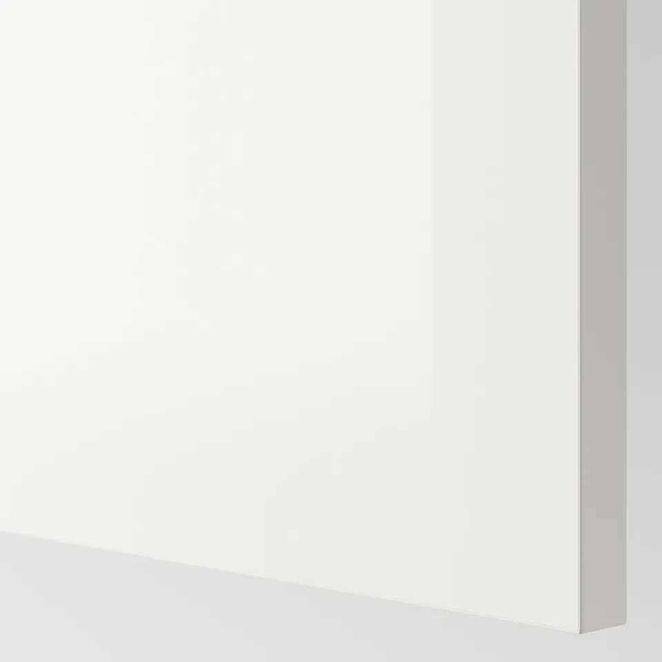 Glossy white cabinet with smooth, stain-resistant surface; part of durable, easy-to-clean series.