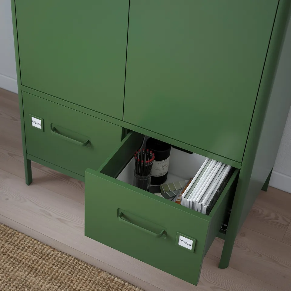 Green IDÅSEN cabinet with open drawer showing tools and supplies, labelled tools.
