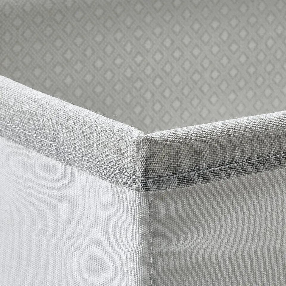 Grey fabric organiser corner with diamond pattern. Part of BAXNA series.