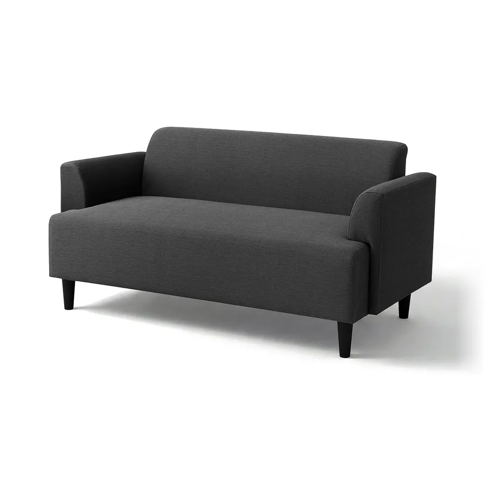A modern, grey HEMLINGBY sofa with dark legs, designed for small spaces.