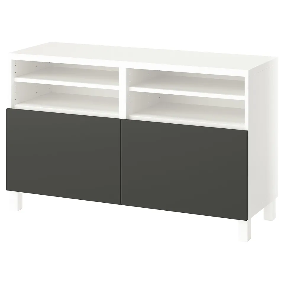 A white and grey BESTÅ tv stand with shelves, featuring a modern design with open and closed storage spaces.