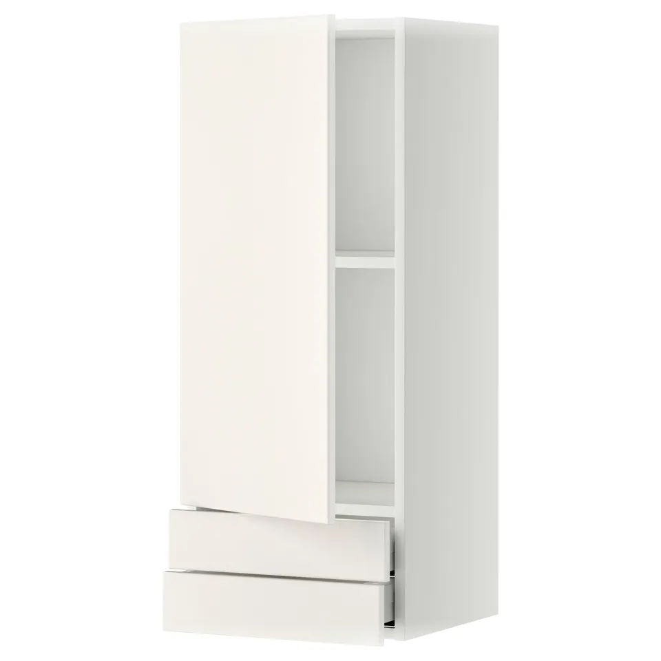 White METOD kitchen cabinet with drawers and shelf.