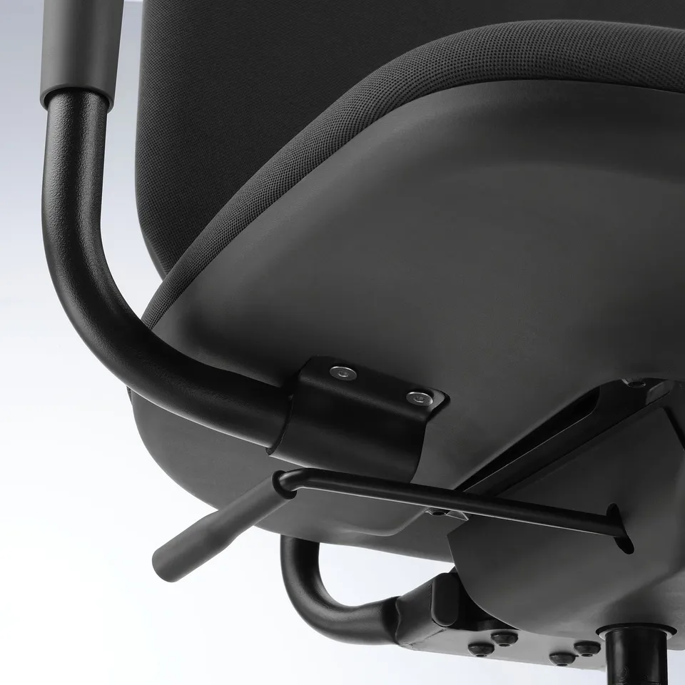 Black office chairs tilt mechanism with adjustable armrests, showcasing quality and comfort.