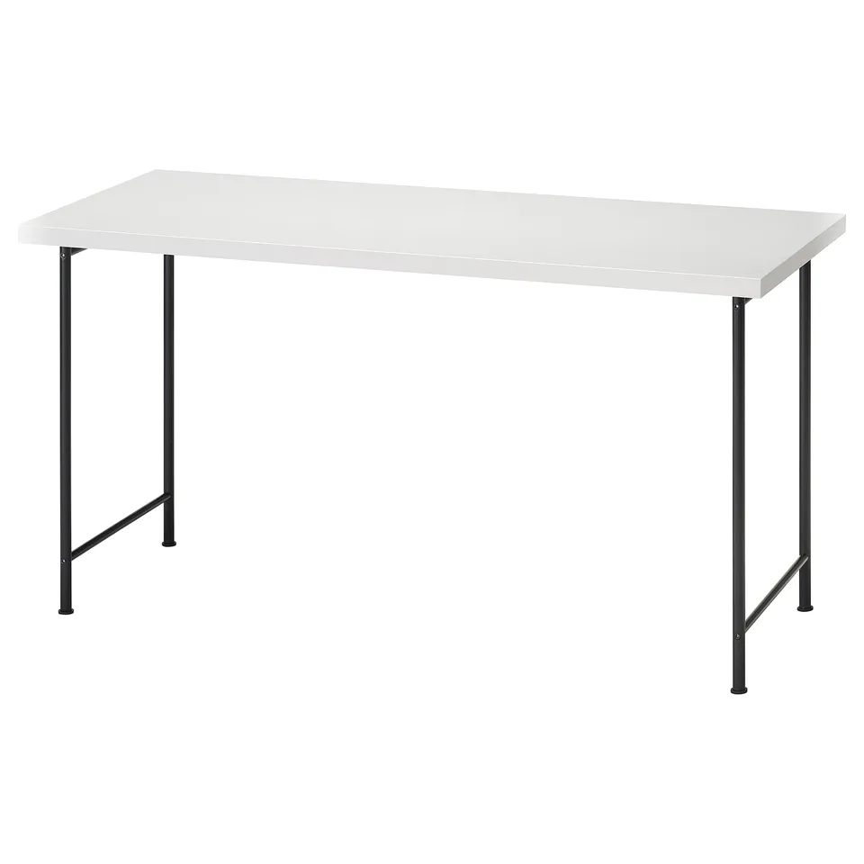 A modern desk named LAGKAPTEN in white with black metal legs. Simple and minimalist.