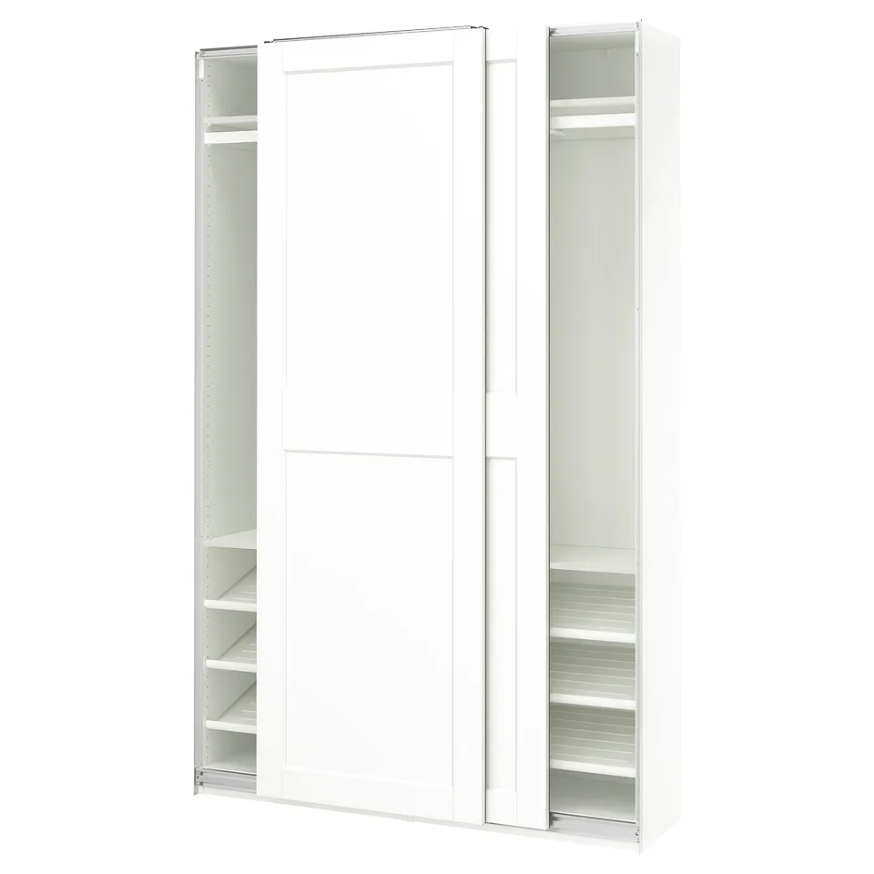 A white ikea PAX wardrobe with sliding doors and internal shelves.