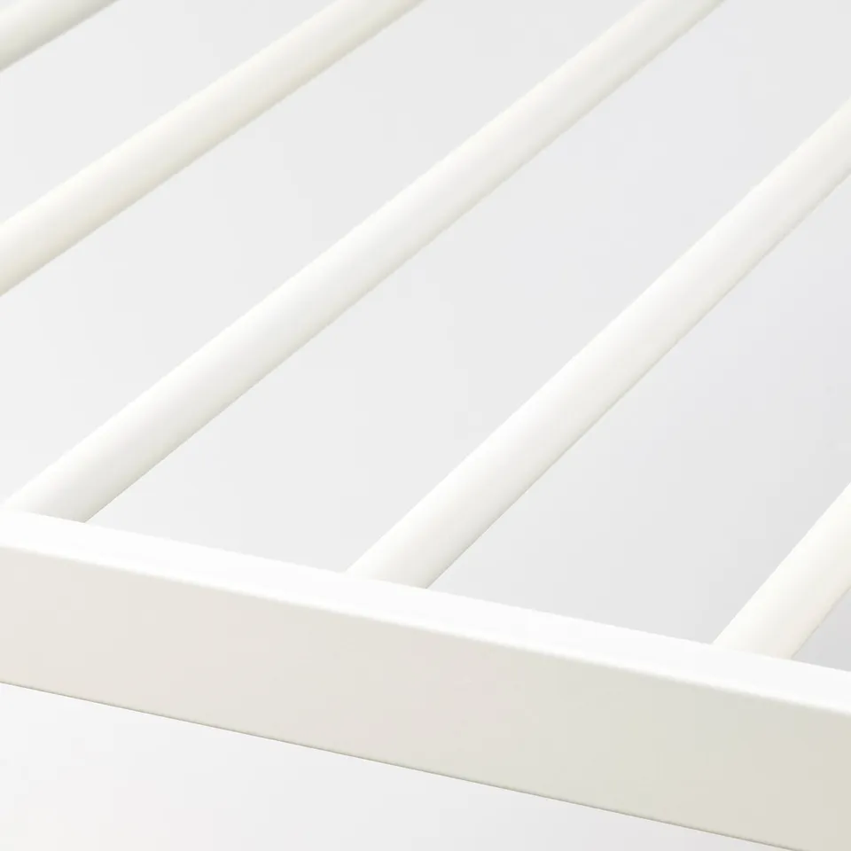 Sleek white trouser hanger with smooth, soft-closing action. Easily pulls out for easy reach.