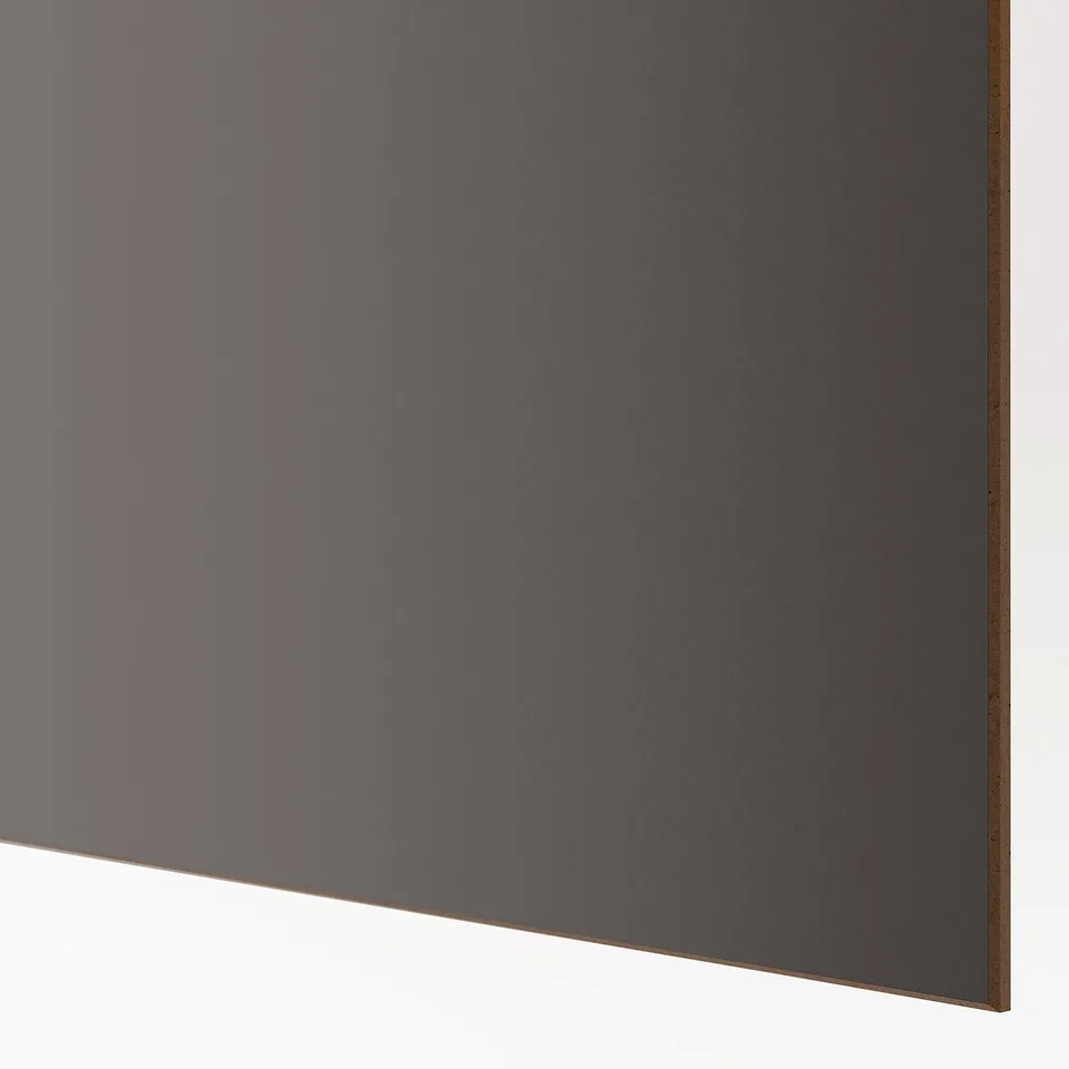 Abstract a modern wardrobe corner. Displaying sleek, light grey sliding doors and sturdy construction, emphasising quality and design.