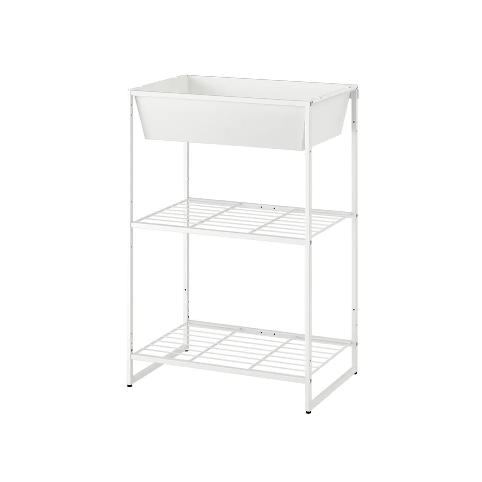 A JOSTEIN white metal storage unit with three shelves, ideal for both indoor and outdoor use.