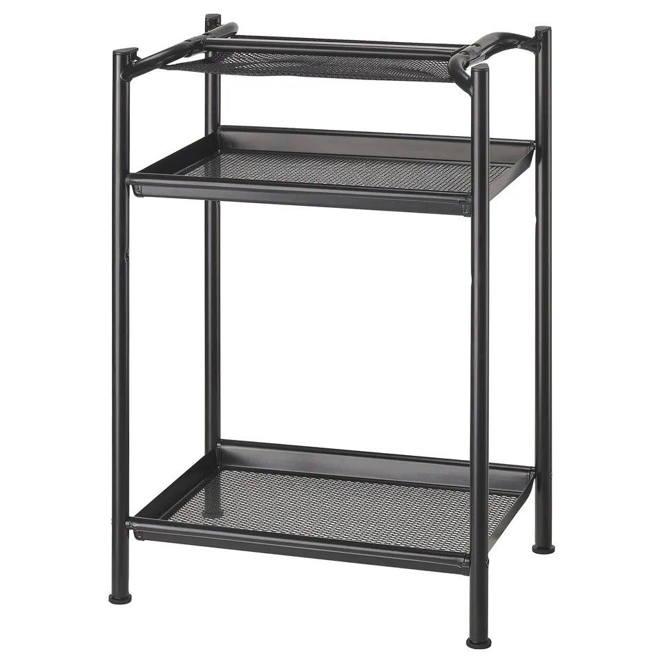 A black SPÄND storage unit. It has two mesh shelves supported by metal legs. Its designed for organising workspace.