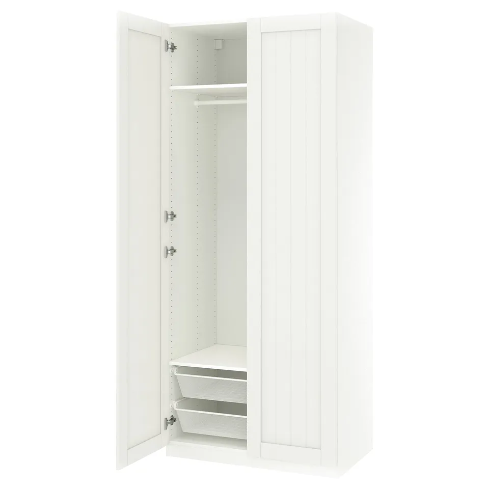 An open white ikea PAX wardrobe featuring a mesh basket inside.