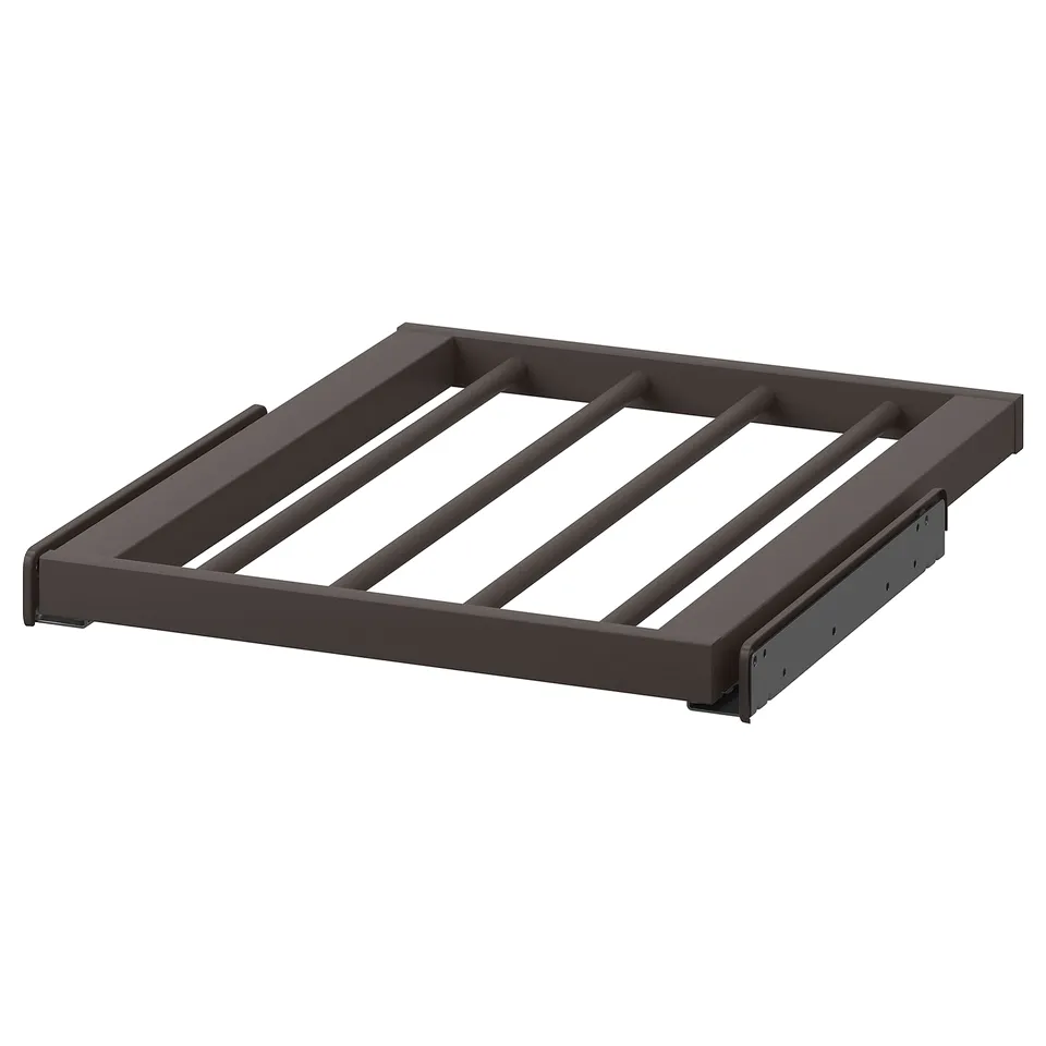 A grey KOMPLEMENT trouser hanger with a steel frame and epoxy coating, designed for organised storage.