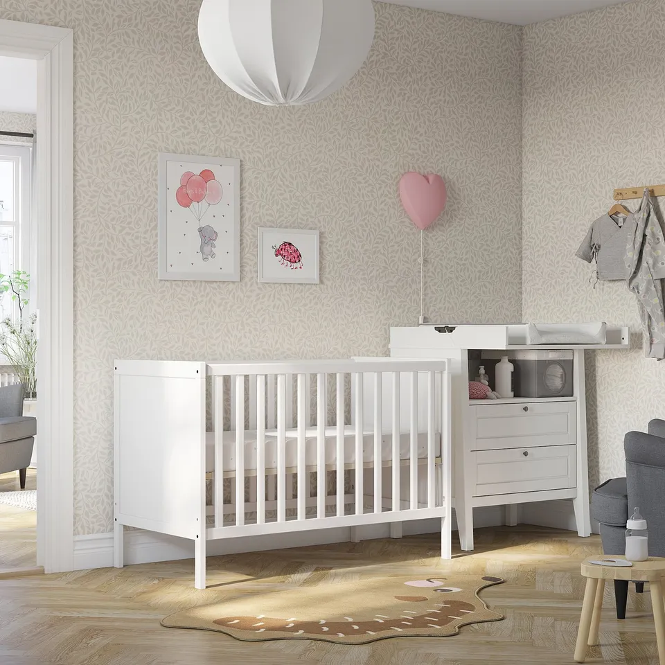 Modern nursery with SUNDVIK crib, light décor, and practical furniture.