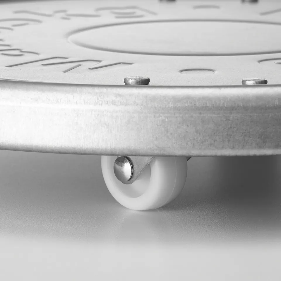 Close-up of galvanised steel plant movers wheel, showcasing durable materials and quality design.