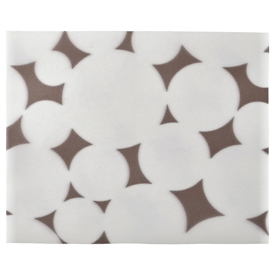 White VÅRKLYNNE place mat with brown, star-shaped patterns, made of recycled polyester.