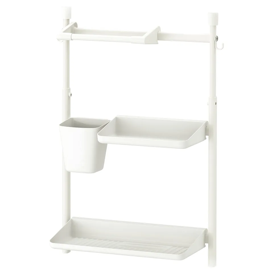 White SUNNERSTA storage rack with shelves and hanging bar for bathroom or kitchen use.