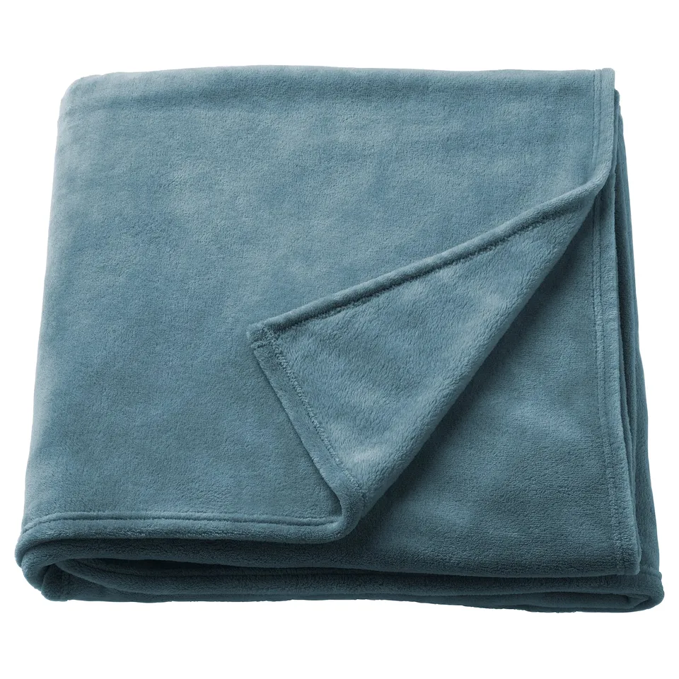 Image a folded blue-grey TRATTVIVA fleece bedspread, rectangular, soft and plush.