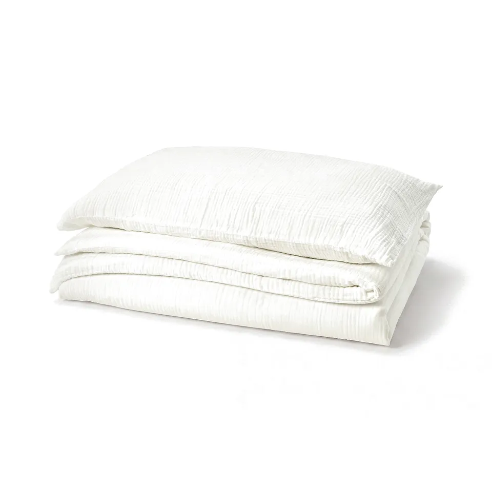White SCHERSMIN duvet set, 100% cotton, folded neatly.