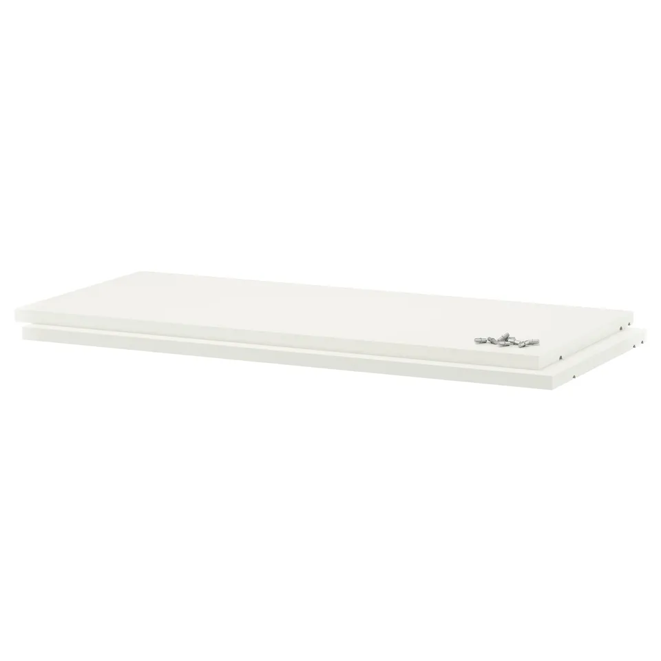 A UTRUSTA white melamine shelf, rectangular in shape, with a scratch-resistant surface.