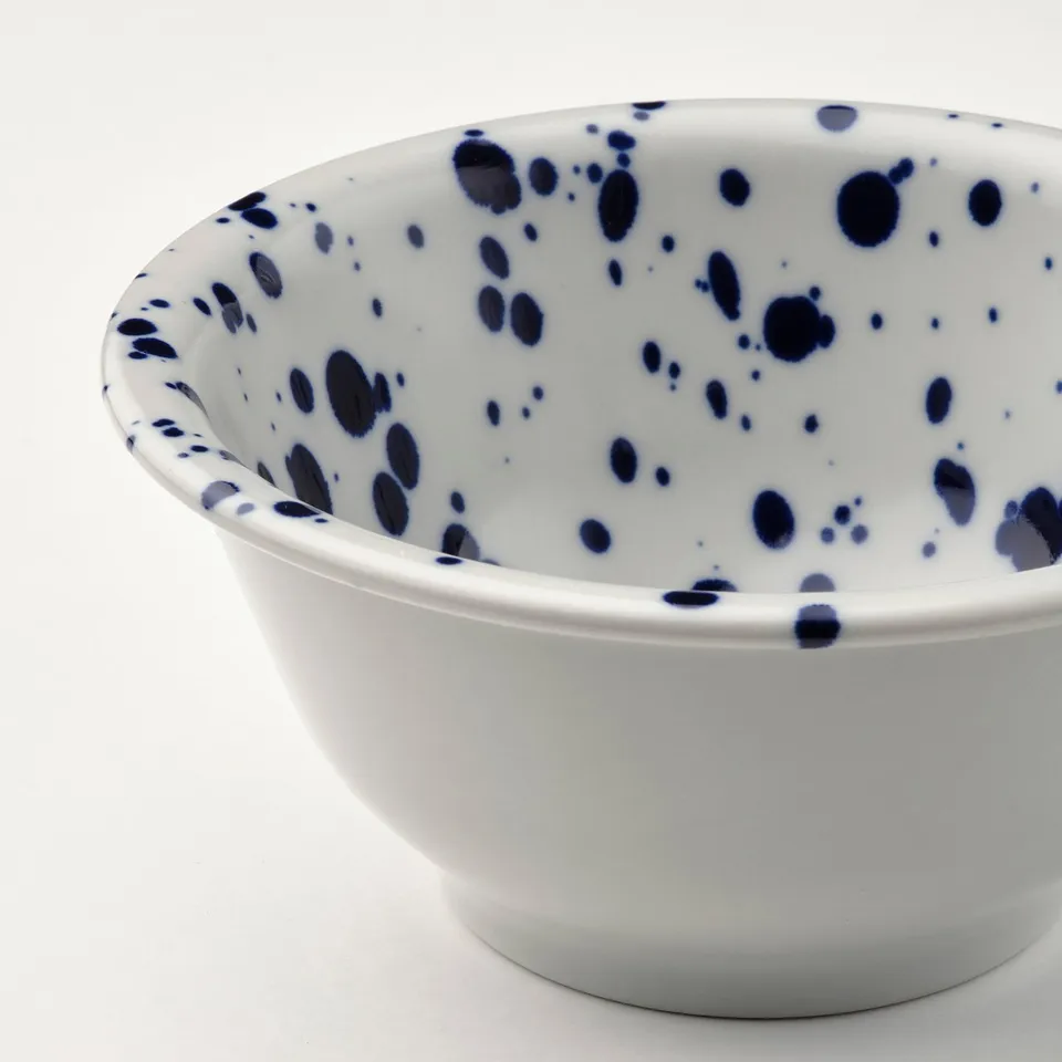 SILVERSIDA bowl, white with blue speckles, smooth edge, elegant & casual design.