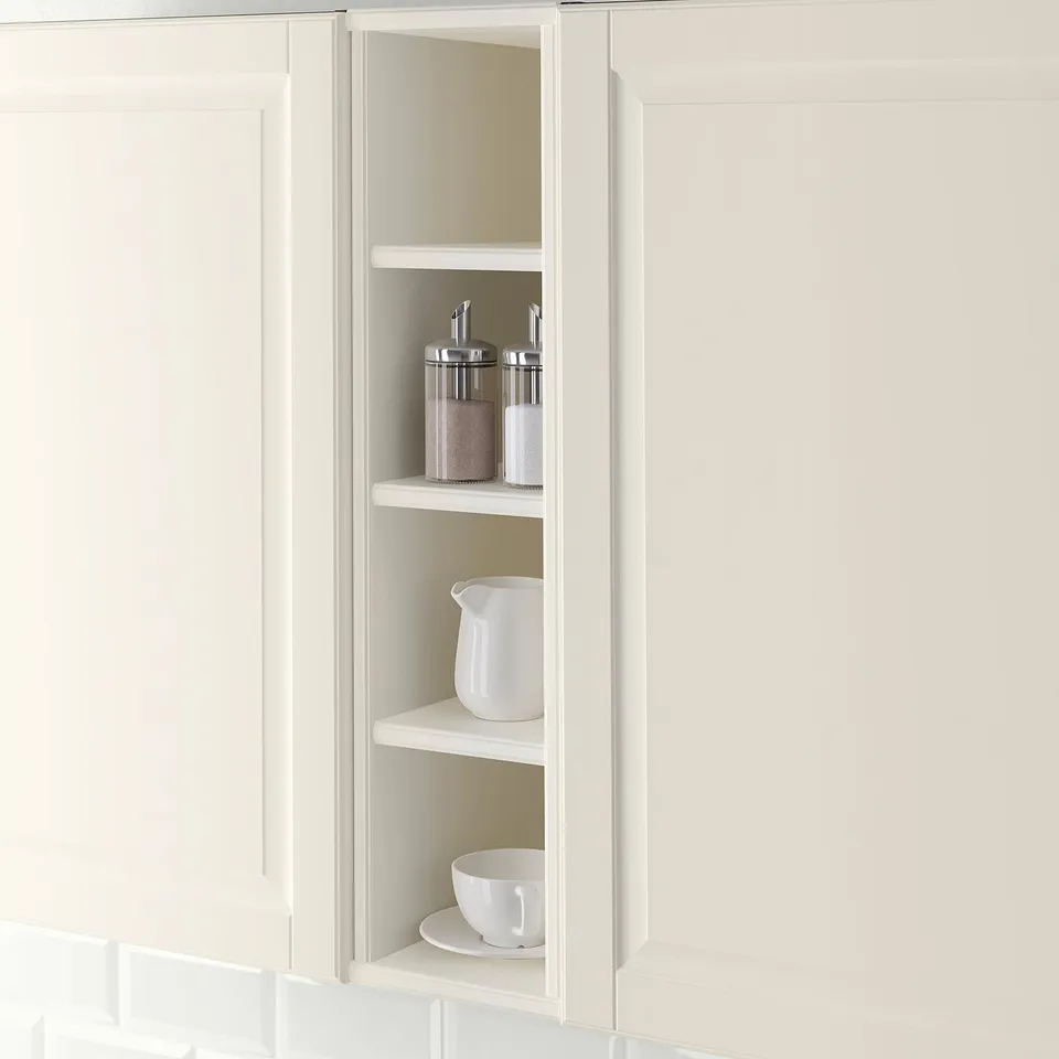 Open kitchen cabinet displays items neatly. Four shelves hold containers and dishes, offering easy access and organisation.