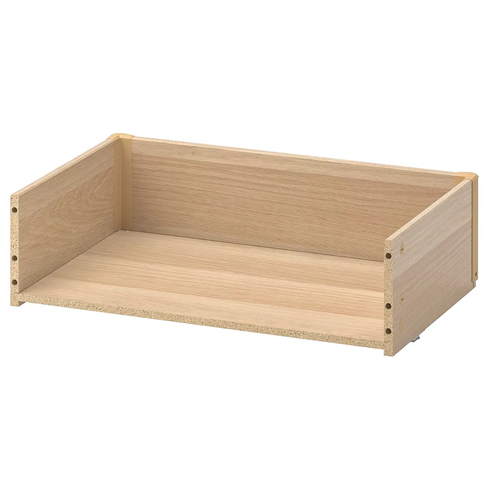 Light wood-colored BESTÅ drawer with back, sides, and bottom made of particleboard and foil.