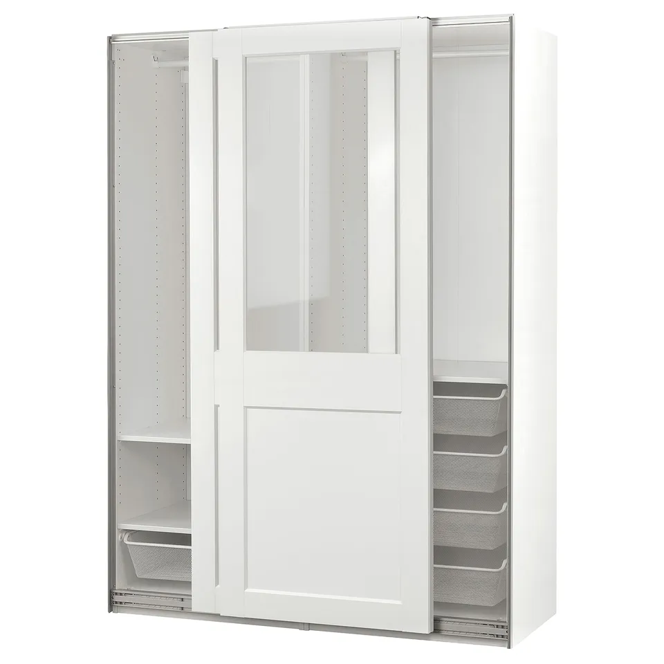 A white PAX wardrobe with glass doors. It mesh baskets and sliding doors for clothes storage.