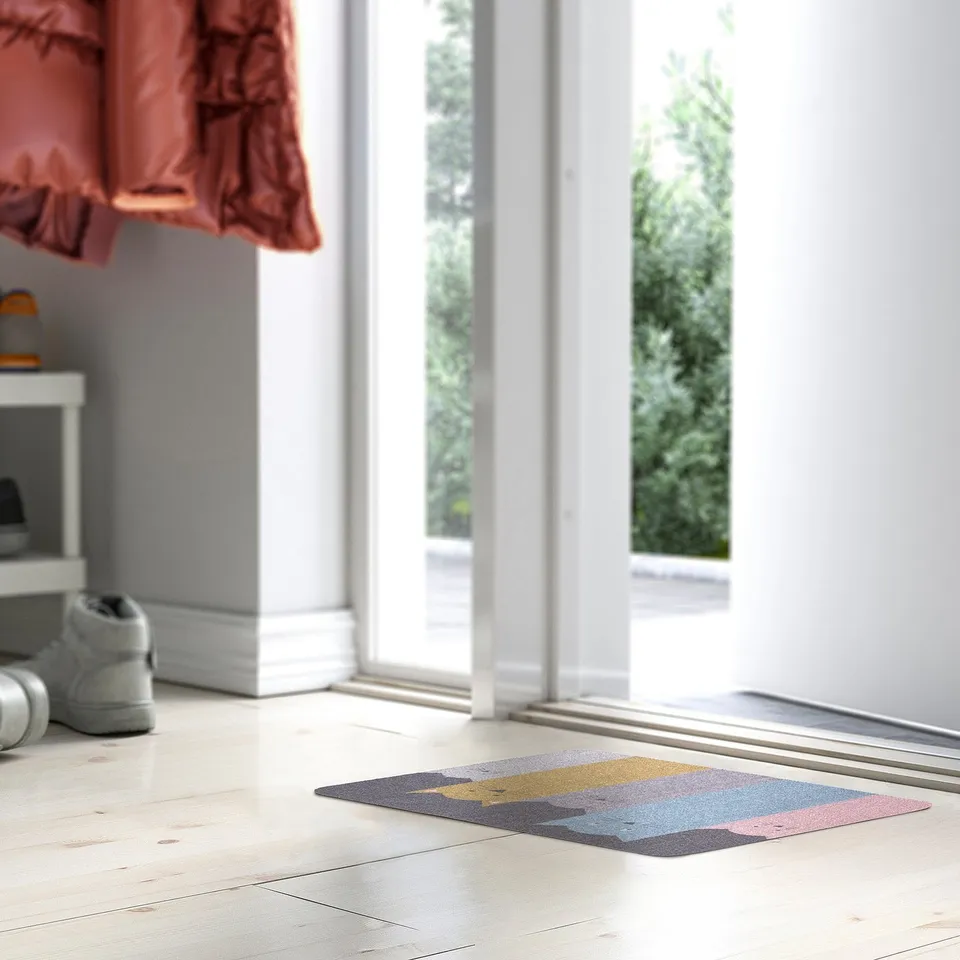 TURISTVÄG door mat, rectangular, colourful, with a patterned design on light wooden floor by entryway. It is smaller than shoes and curtain.
