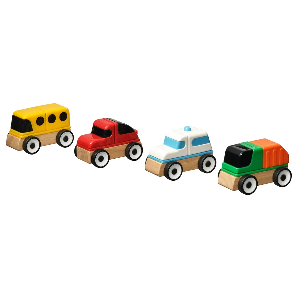 Four assorted toy vehicles, yellow, red, white, and green, crafted from plastic and wood, arranged in a row, perfect for childrens play.