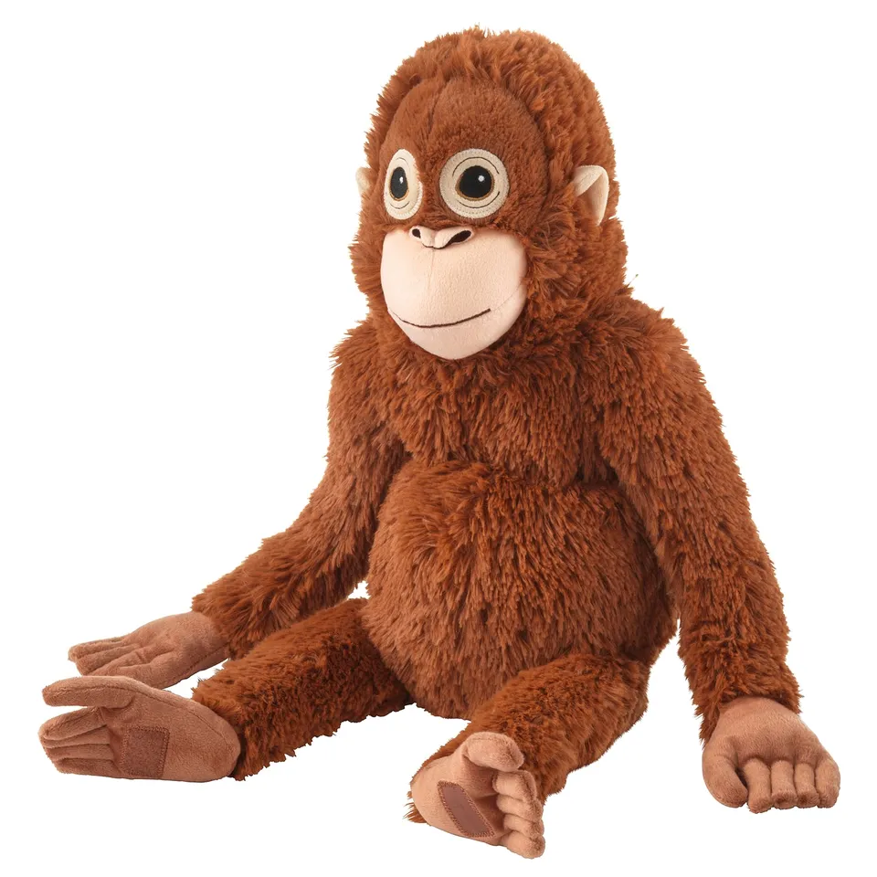 Big brown soft toy ape, sitting straight, friendly face, with hands and feet for hanging.