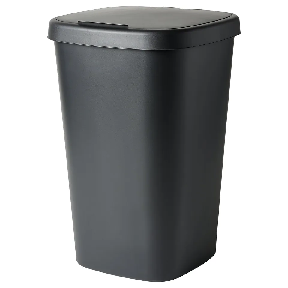 Black standing bin with lid.