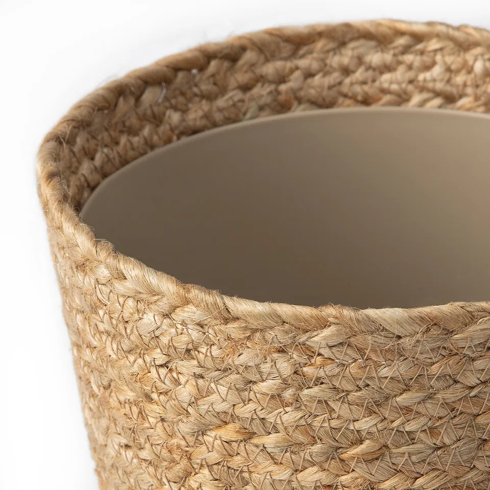 Handwoven jute & cotton plant pot with plastic inner bowl, showcasing natural texture.