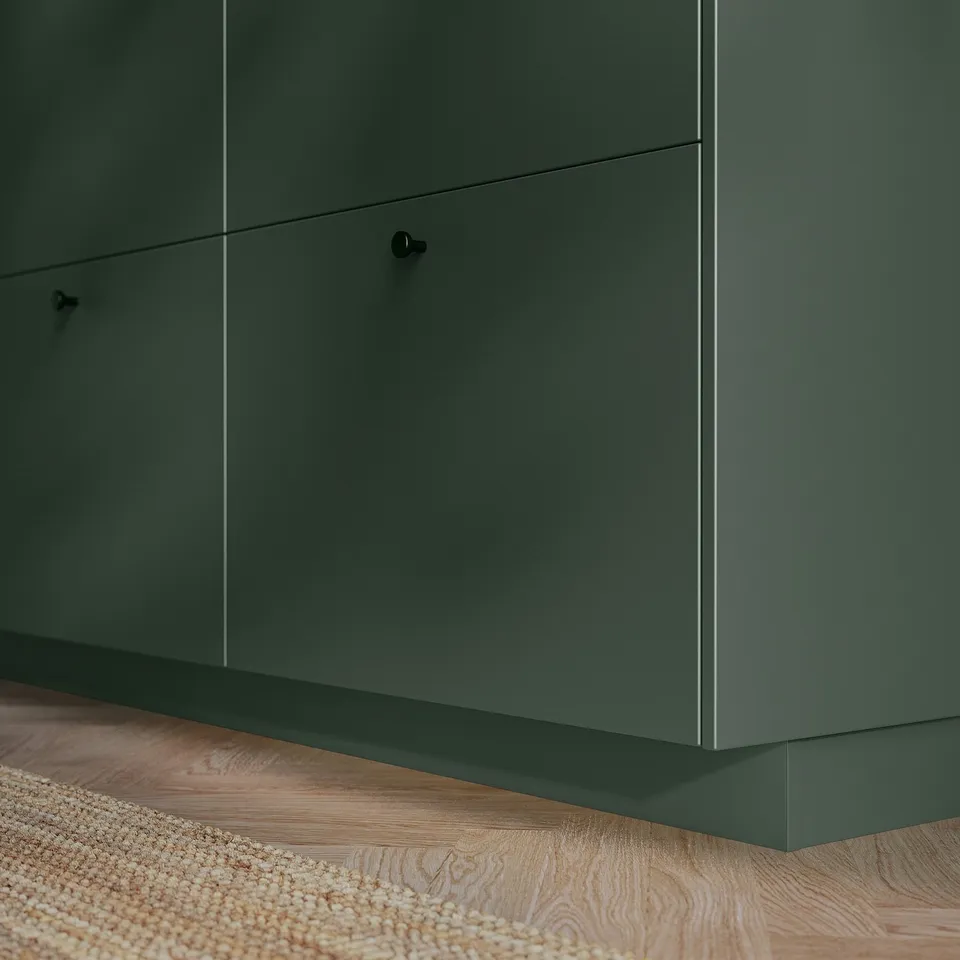 Dark green HAVSTORP kitchen cabinets, sleek design with smooth surface and minimalist handles.