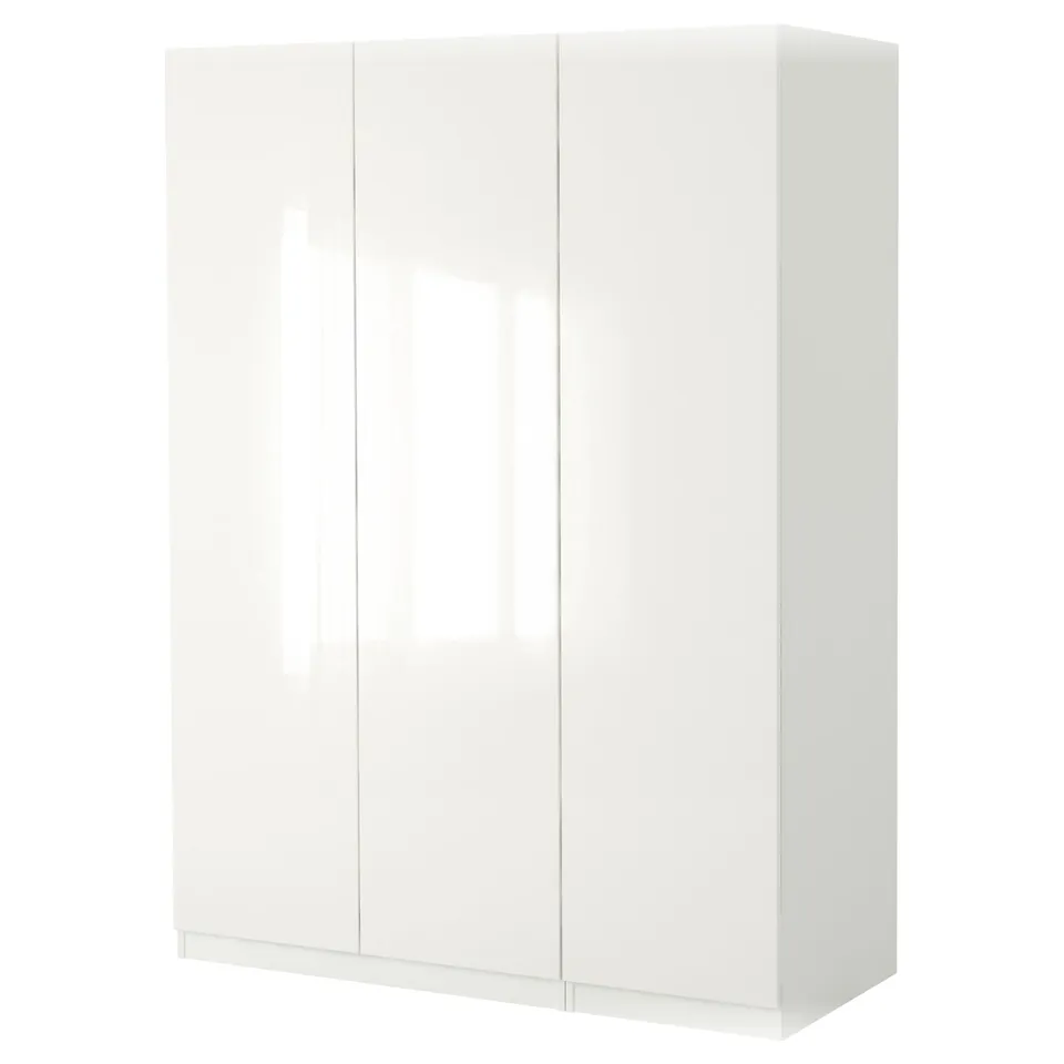A white ikea PAX wardrobe, featuring a sleek design with glossy doors and a rectangular shape.