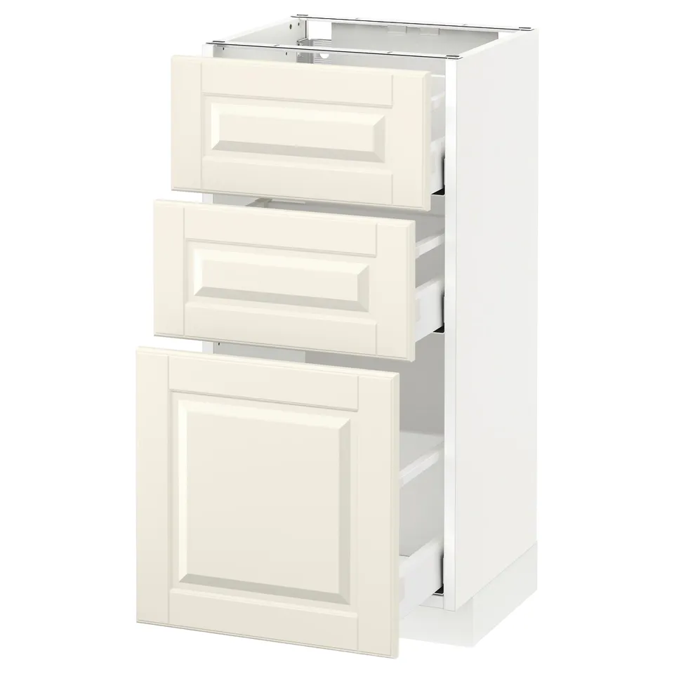 A white IKEA kitchen cabinet with three drawers and a door. It off-white bevelled edge fronts.