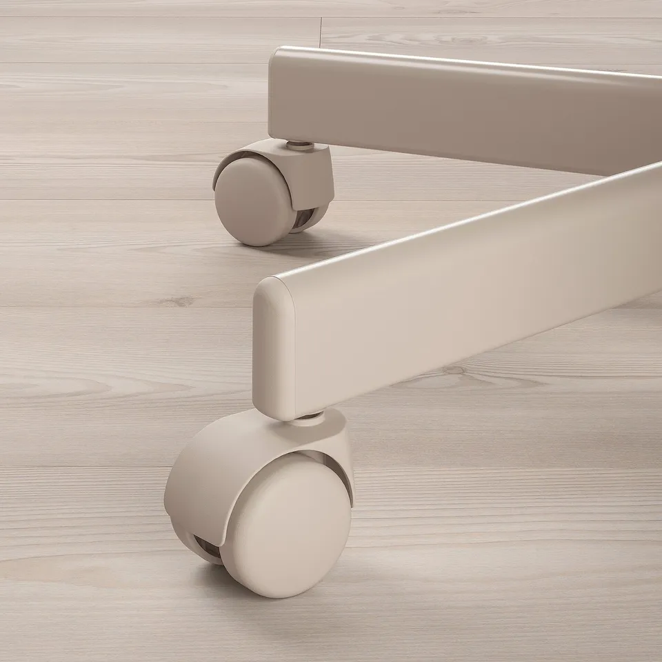 Beige office chairs casters and base on light wooden floor. High-quality materials and design.