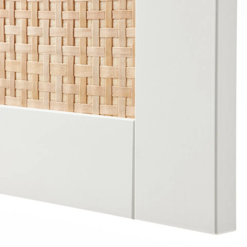 Modern woven basket edge, intricate craftsmanship on smooth surface.