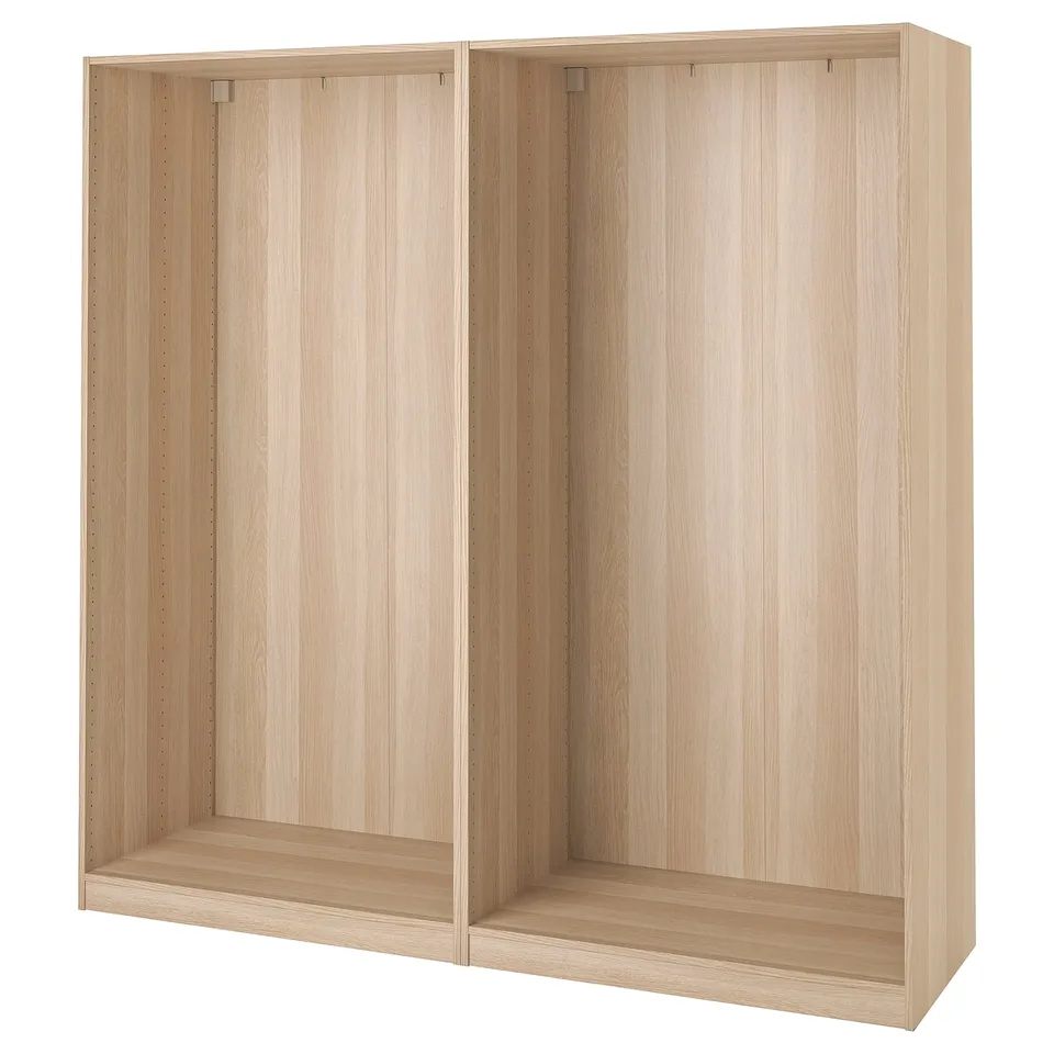 Ikea PAX: light wooden wardrobe frame, rectangular, modular design.