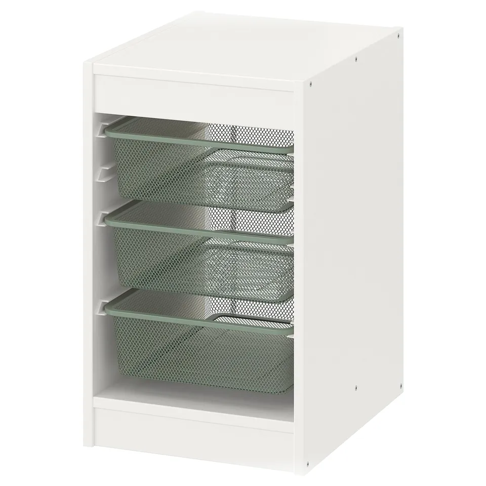 A white TROFAST storage unit with three green mesh drawers. Its a rectangular, modern design for organising items.