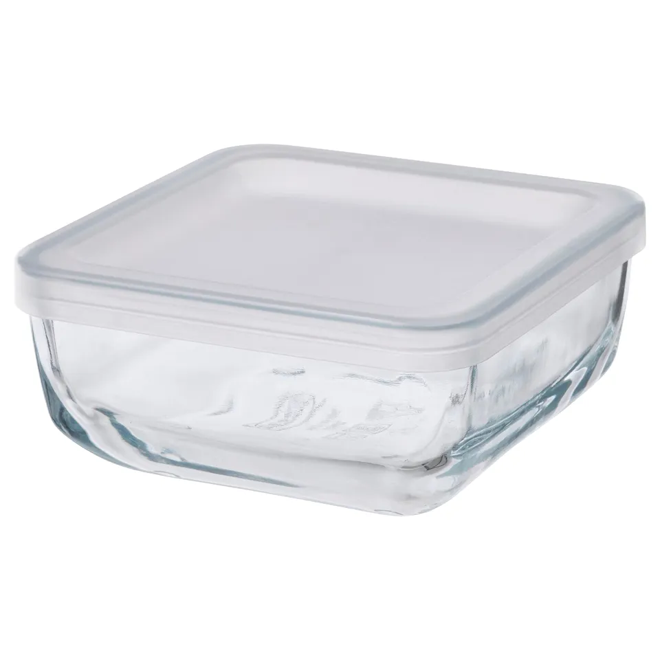 A clear glass BESTÄMMA food container with a white lid, designed for fridge use. Rectangular shape, suitable for storing leftovers.