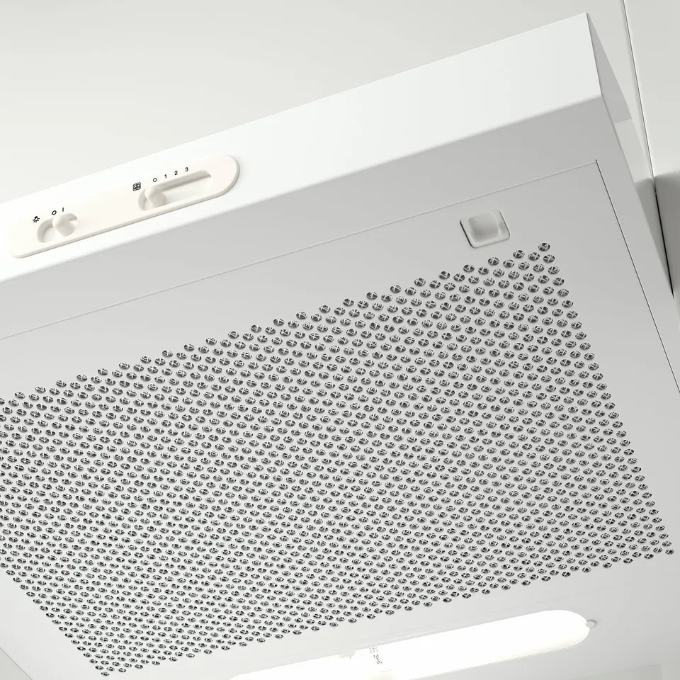 White kitchen hood with perforated airflow design, center-mounted controls, and led light. Perfect for modern kitchens.