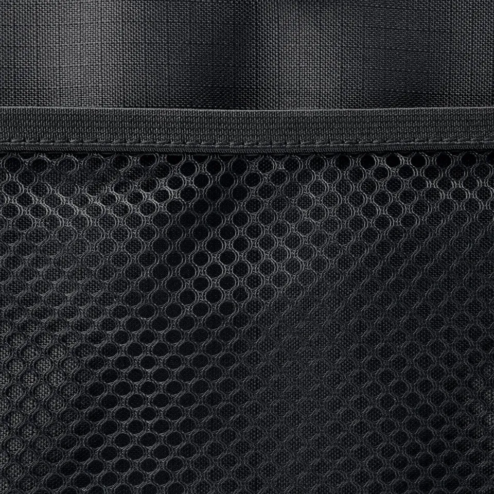 Black lunch bag with mesh pocket, robust handles, and insulated interior.