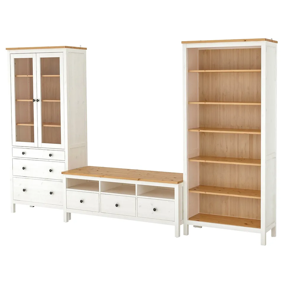 Three-piece furniture set: white HEMNES tv stand, bookcase, and glass-door cabinet, featuring solid pine and adjustable shelves.